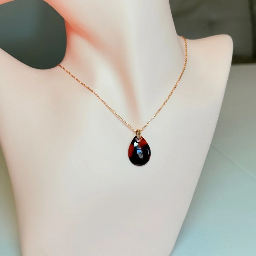 Gold Chain Necklace with Black Teardrop Pendant